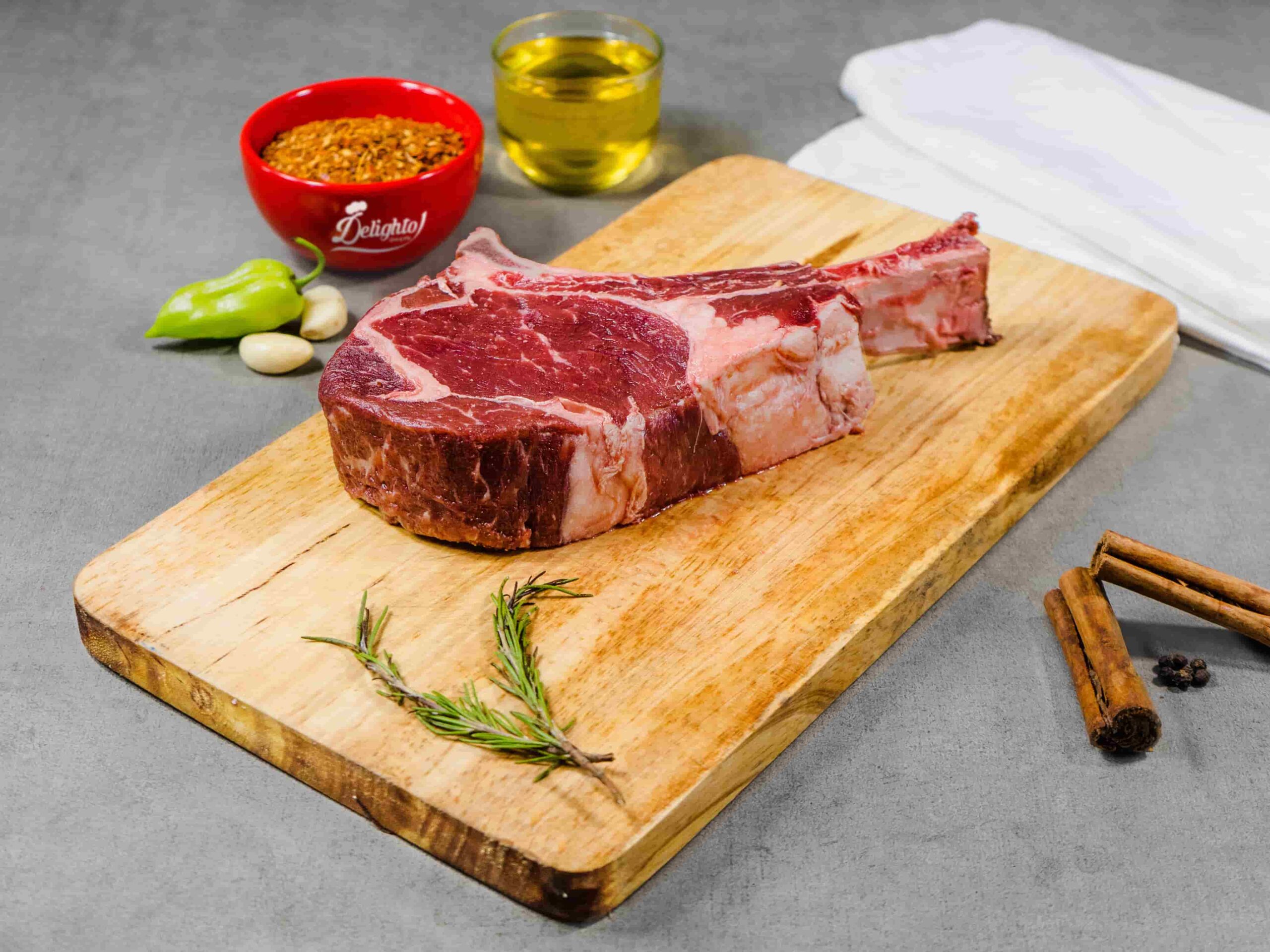 PREMIUM RIB EYE STEAK (BONE -IN )(1KG)